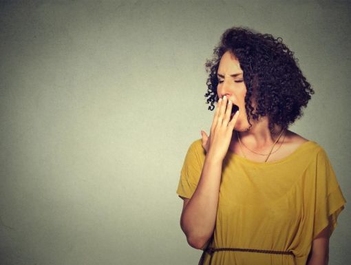 Woman Yawning