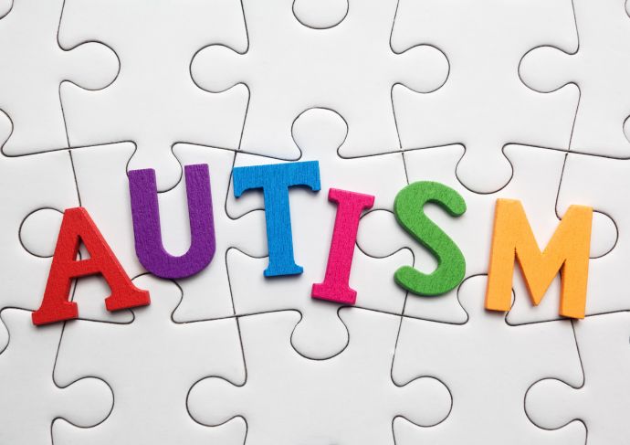 jigsaw puzzle that spells out the word "autism''