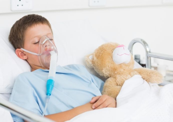 494386711 Boy Wearing Oxygen Mask In Hospital