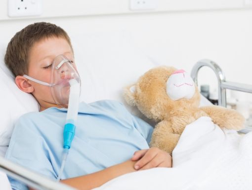 494386711 Boy Wearing Oxygen Mask In Hospital