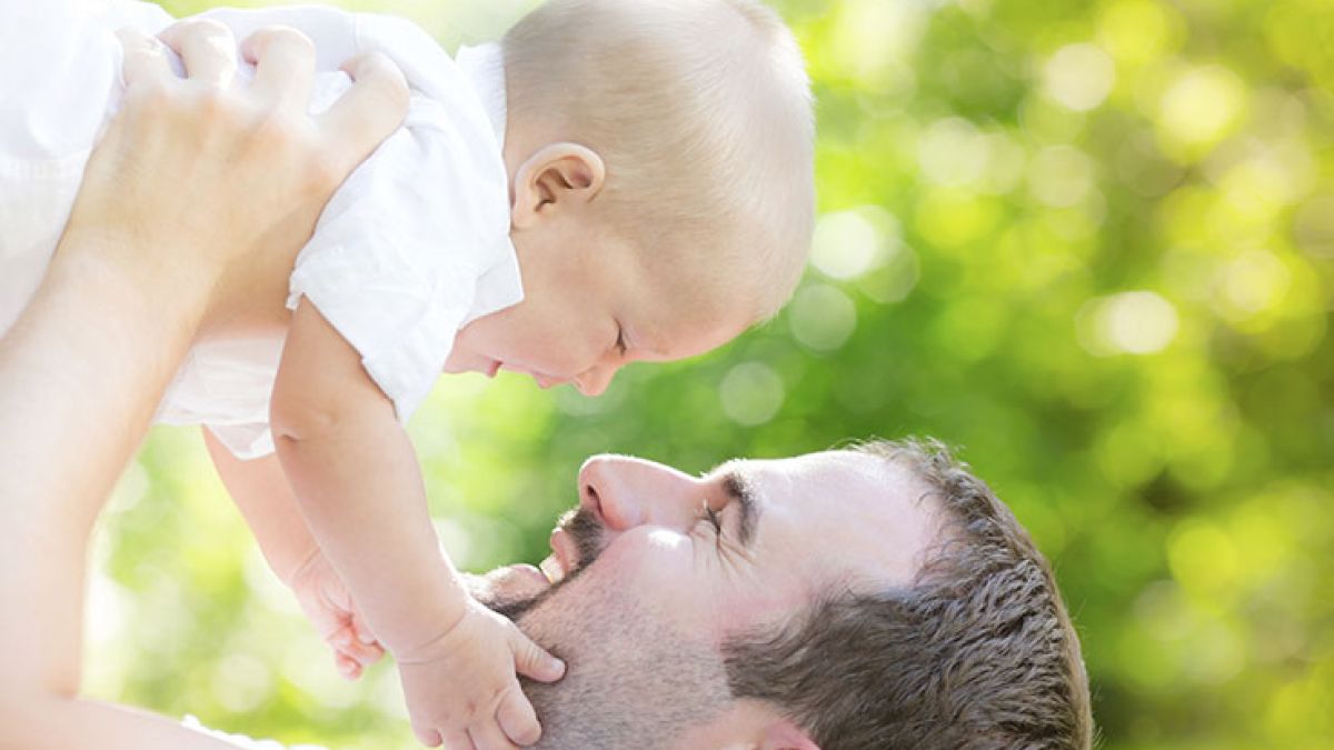 480502081 Father Holding Baby