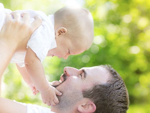480502081 Father Holding Baby