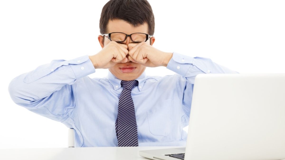 477474469 Businessman Rubbing Eyes