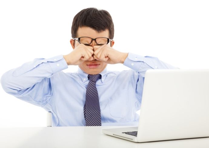 477474469 Businessman Rubbing Eyes