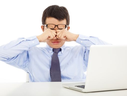 477474469 Businessman Rubbing Eyes