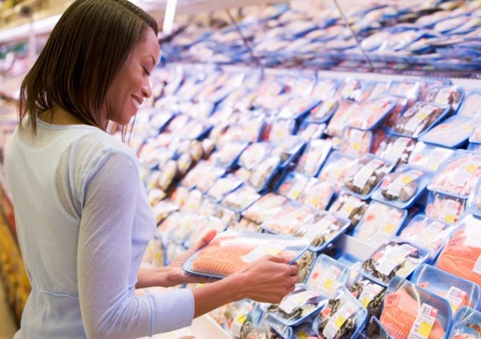 84462595 Woman Shopping For Fish