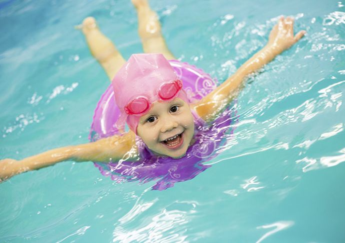 160892303 Little Girl Swimming In Pool