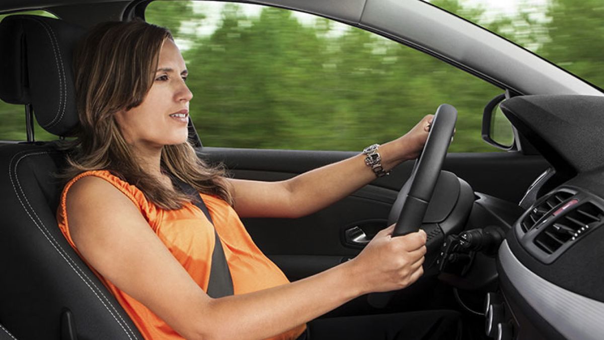 Pregnant Woman Driving Car