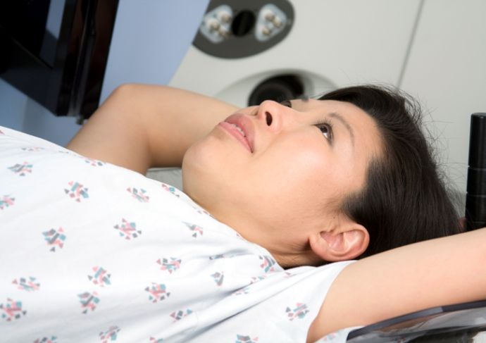 134544729 Woman Undergoing Exam