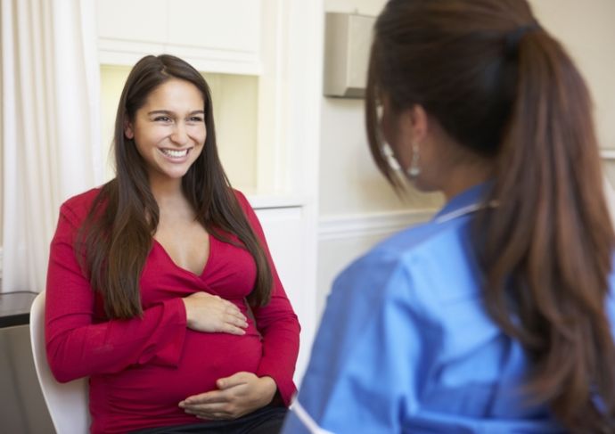 458842749 Pregnant Woman Meeting With Nurse