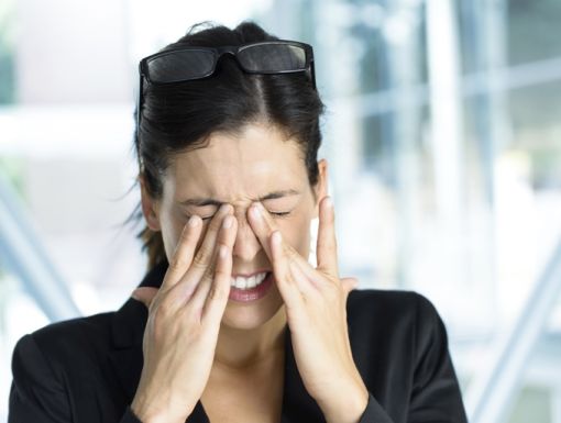 184016607 Woman Rubbing Eyes