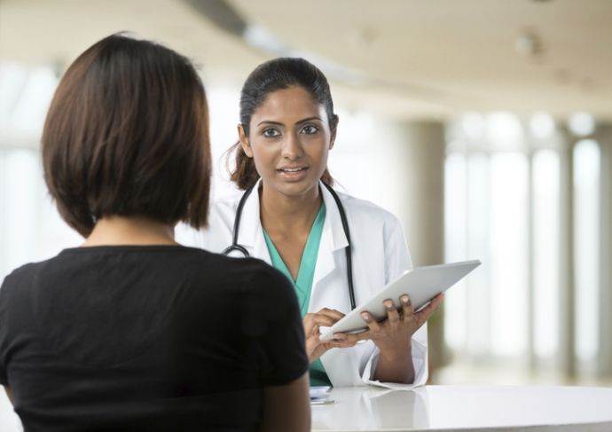 177774022 Doctor Consulting With Patient