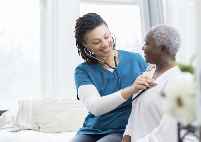 Gettyimages 932074828 Woman Getting Check Up