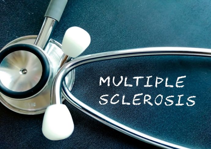 Multiple Sclerosis written on black background with stethoscope