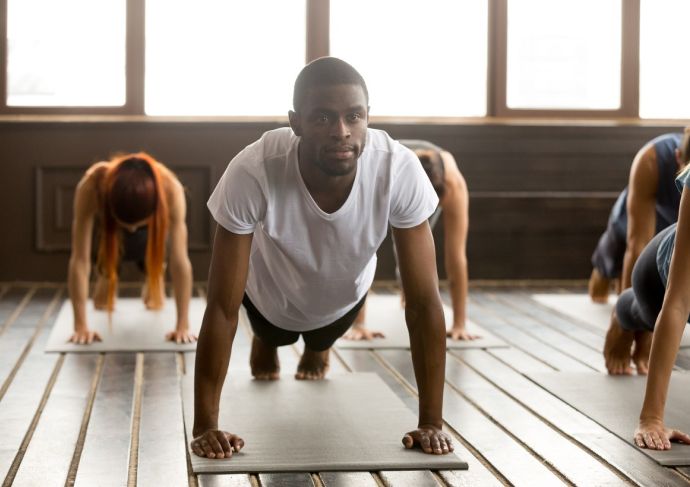 Young man in Plank pose