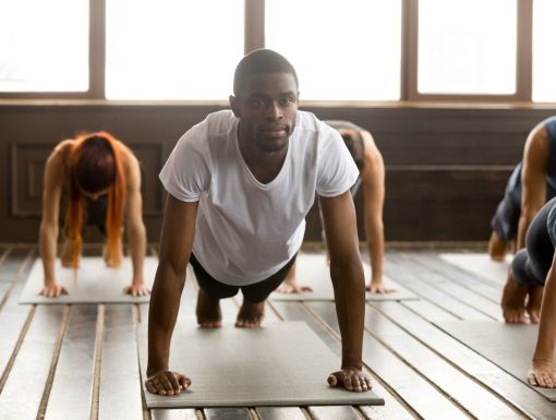 Young man in Plank pose