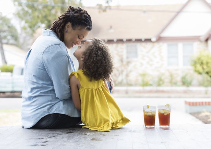 Getty Images 927892046 mom and daughter on porch