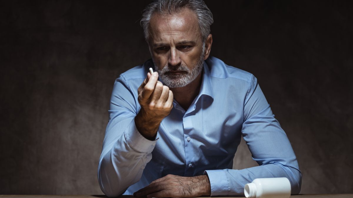 Man with drugs Getty Images 1024106306