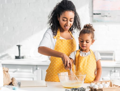 mother and daughter baking together