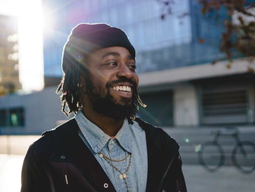 Man outside smiling