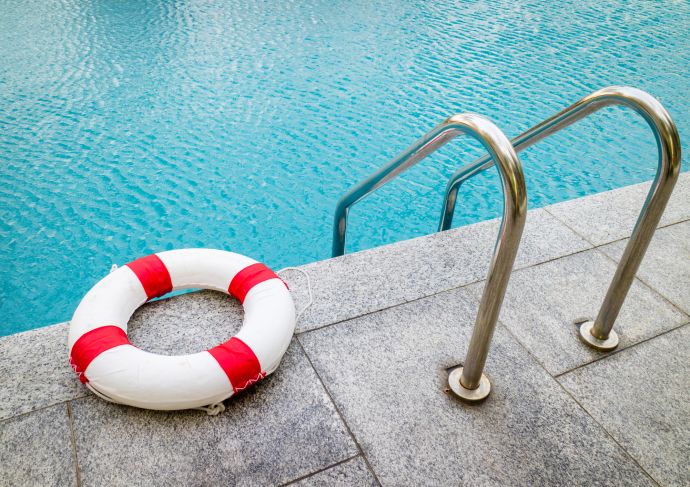 Getty Images 673375368 pool side safety medium