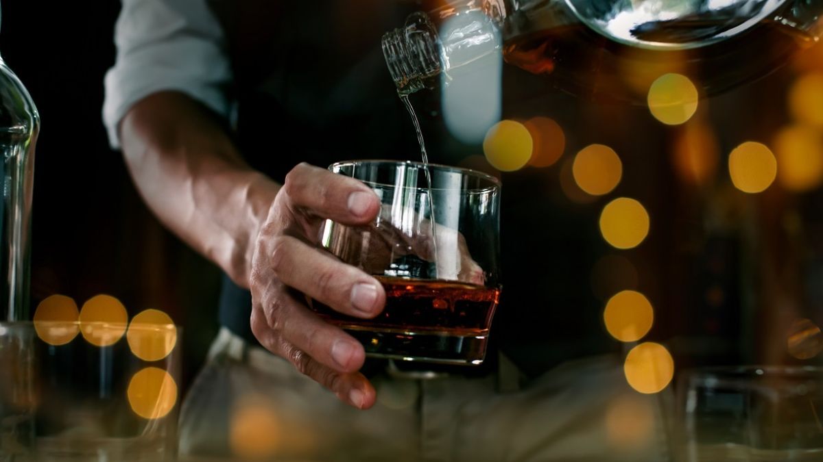 Bartender serving a drink