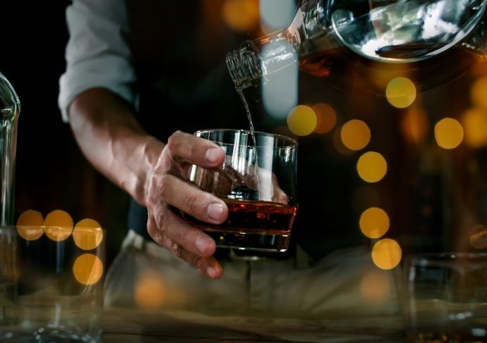 Bartender serving a drink