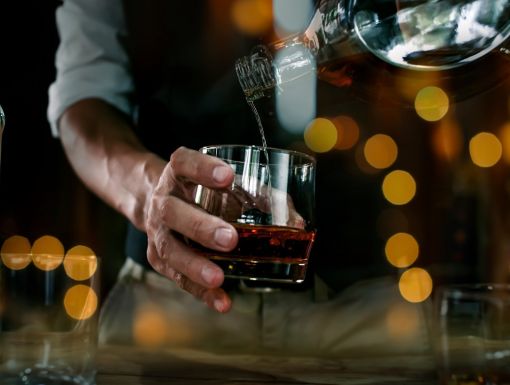 Bartender serving a drink