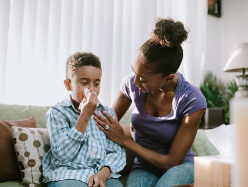 Child blowing nose