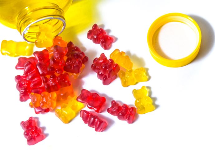 an open bottle of gummy vitamins