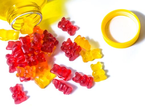 an open bottle of gummy vitamins