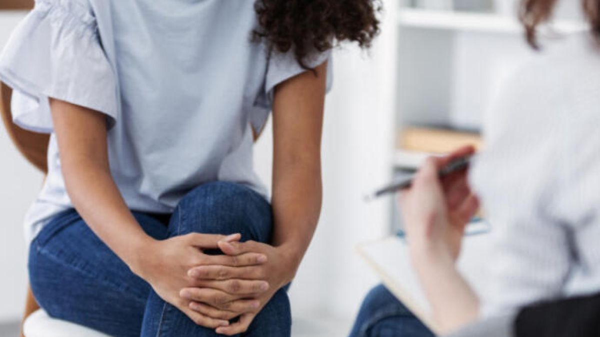 Woman talking to her doctor about fertility