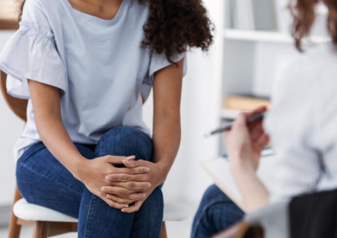 Woman talking to her doctor about fertility