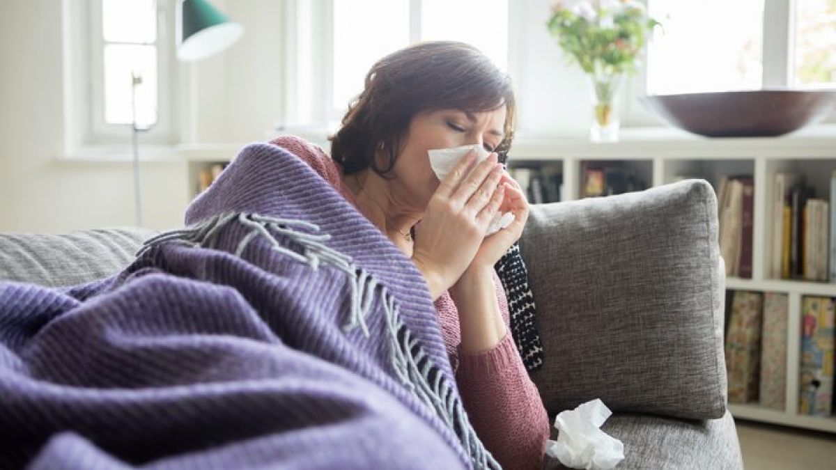 Women Blowing Her Nose