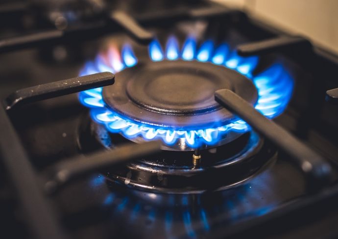 Kitchen gas cooker with burning blueflames fire propane gas