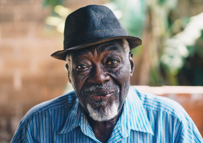 Older man wearing hat