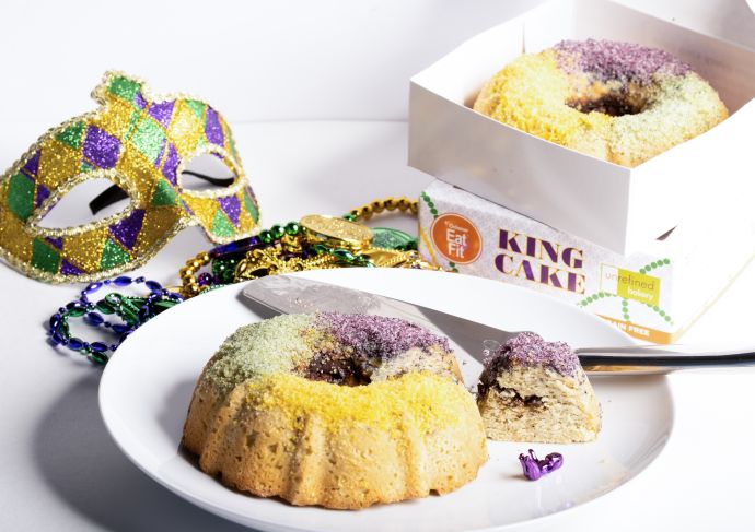 Eat Fit King Cakes next to Mardi Gras mask