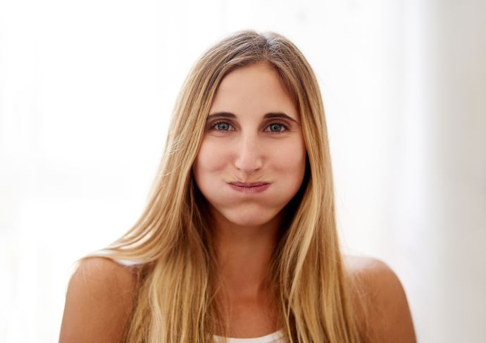 Woman holding breath for hiccups