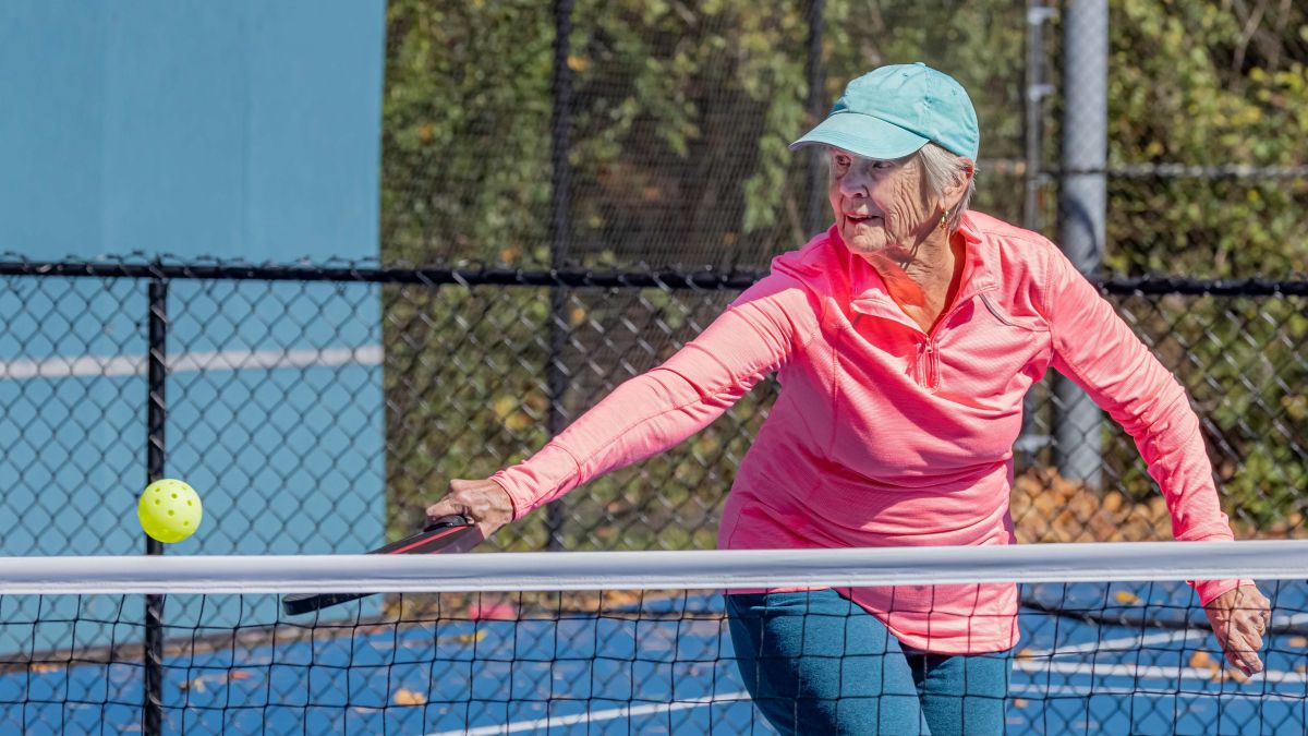 Woman playing pickleball