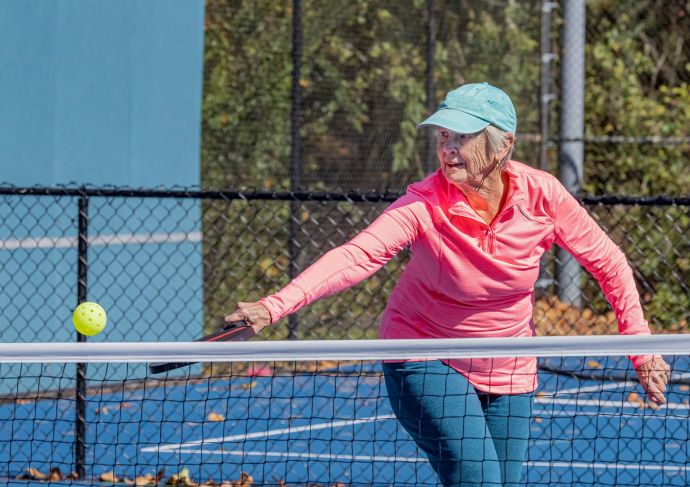 Woman playing pickleball