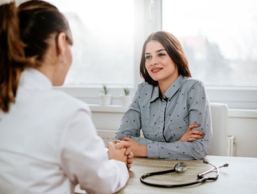 Women talking to doctor