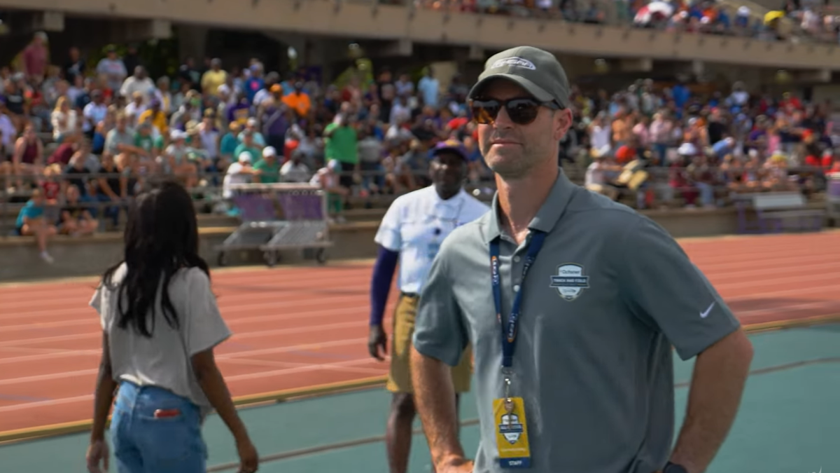 Man at track and field event