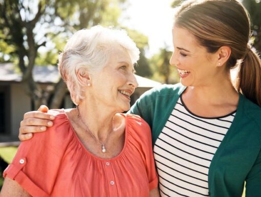 Daughter and older mother looking at eachother