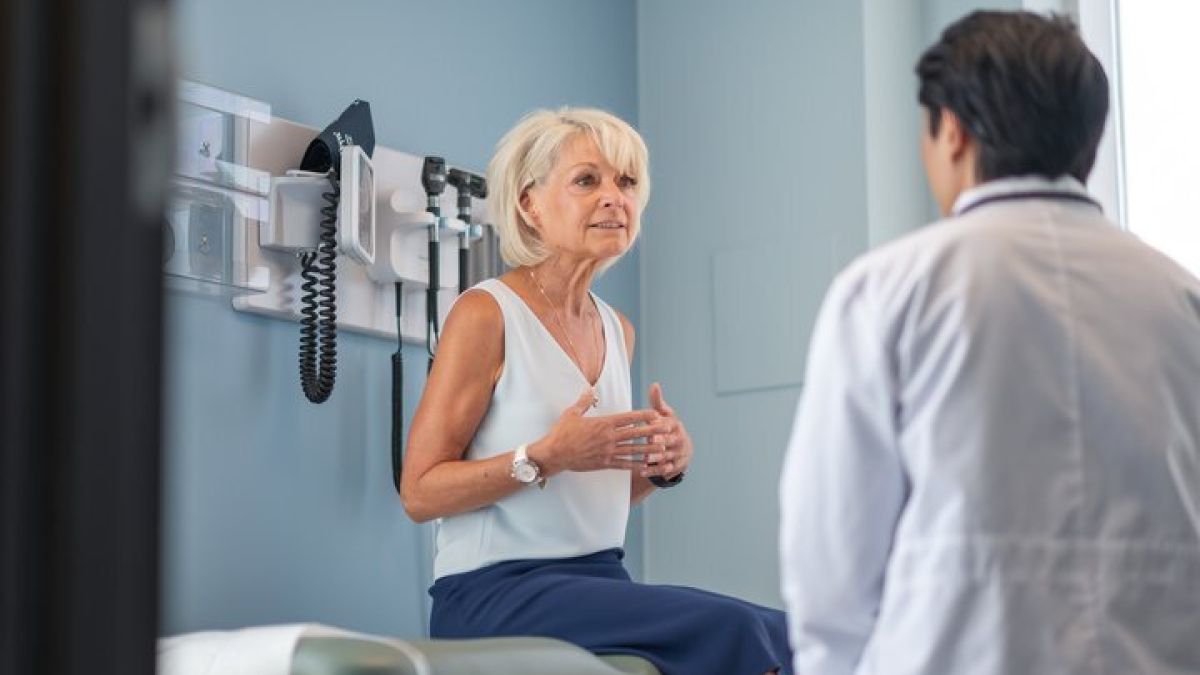Older female patient with male doctor