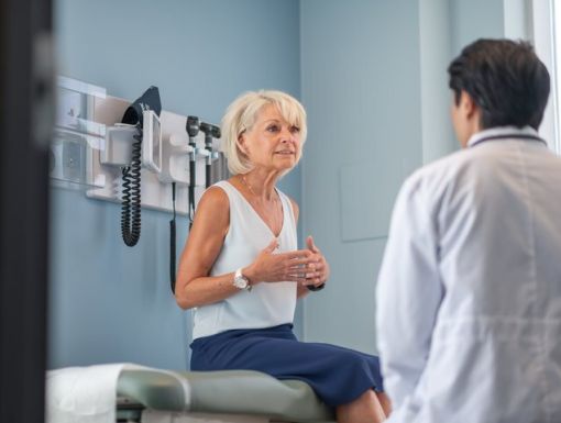 Older female patient with male doctor