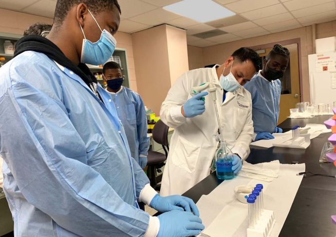 Son of a Saint students and Ochsner tech