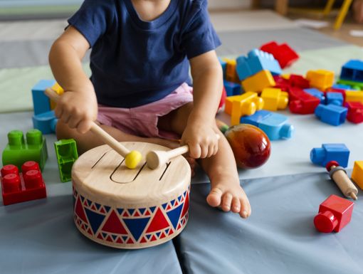 Child with Blocks and Music