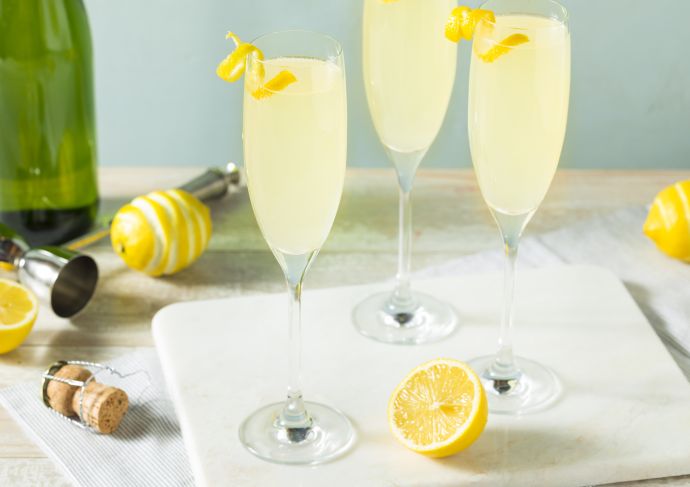 French 75 mocktails in champagne flutes