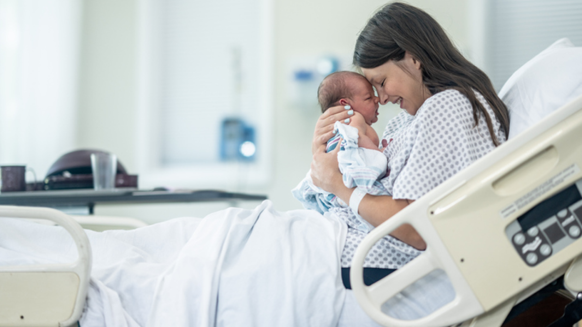 Mother with newborn baby in hospital
