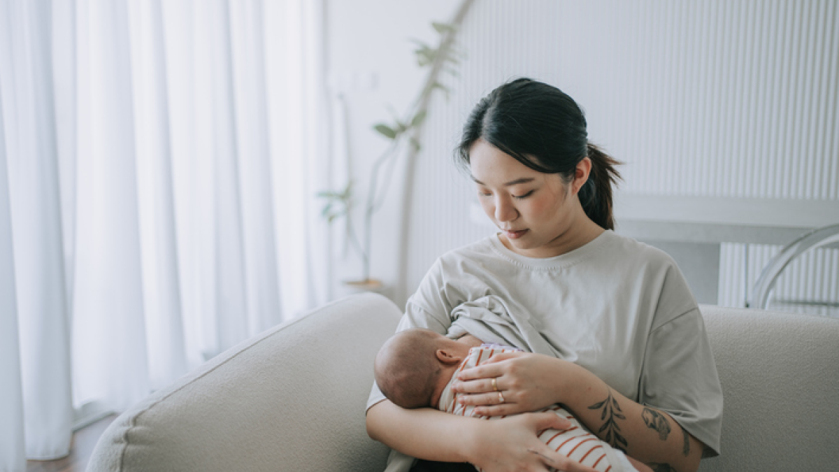 Woman breastfeeding her baby